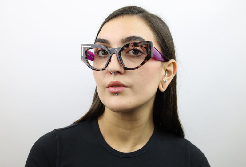 Woman wearing these luxury designer SEE Eyeglasses